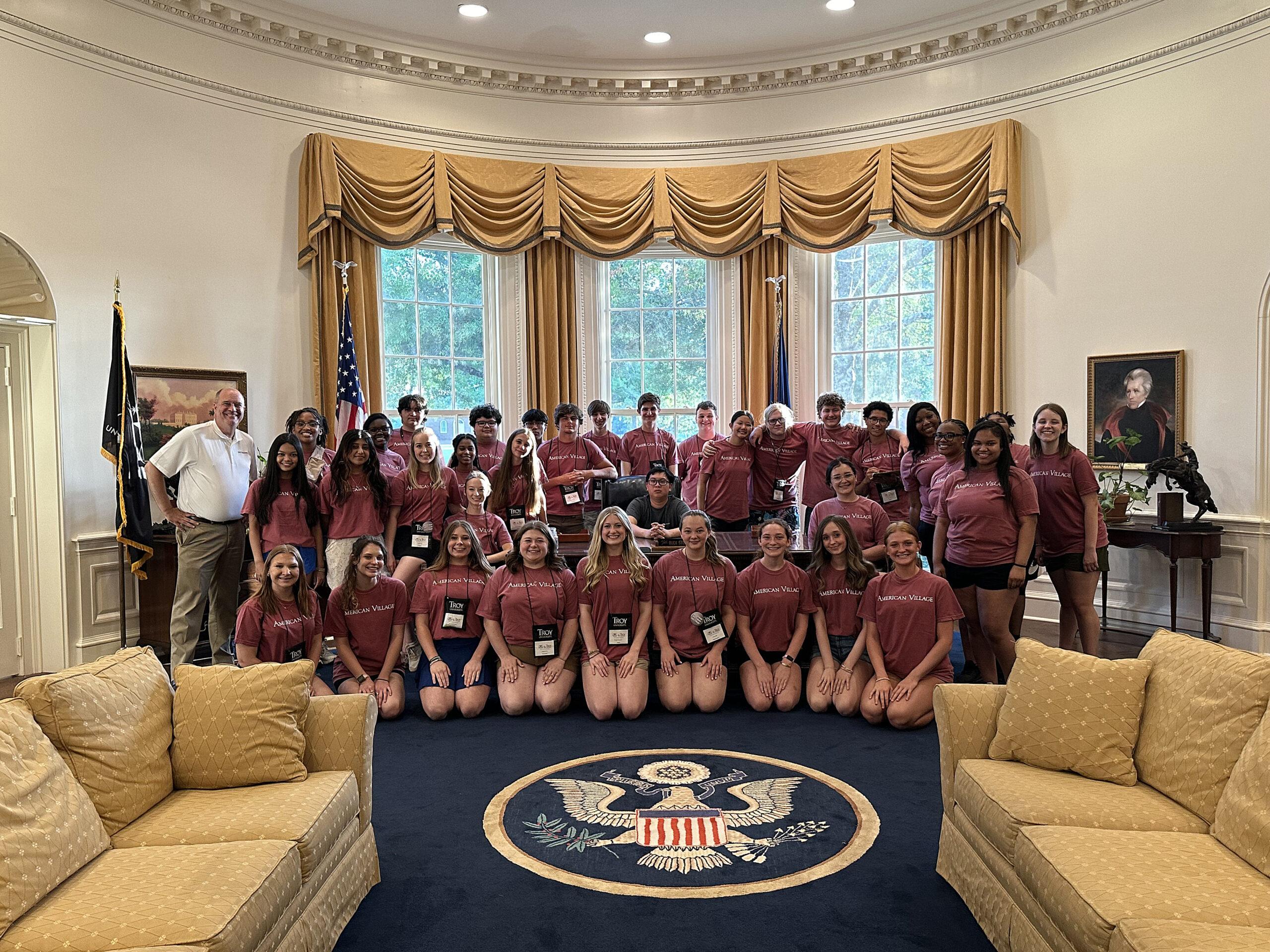 Trojan Patriot Academy group photo at American Village Oval Office